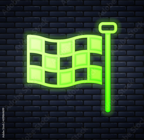 Glowing neon Checkered flag icon isolated on brick wall background. Racing flag. Vector