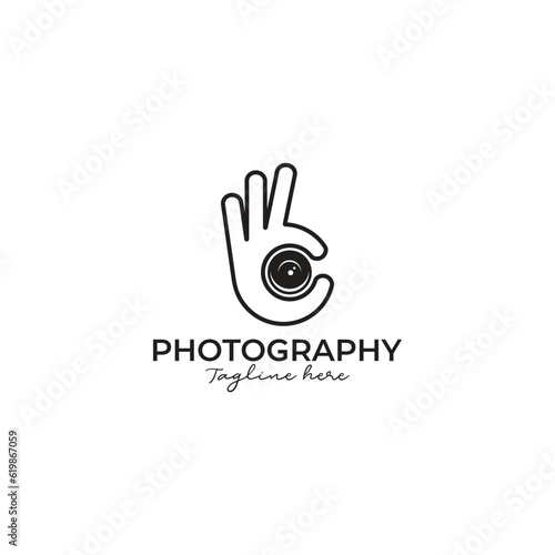 camera logo in the hands of the photographer