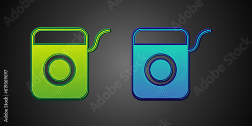 Green and blue Dental floss icon isolated on black background. Vector