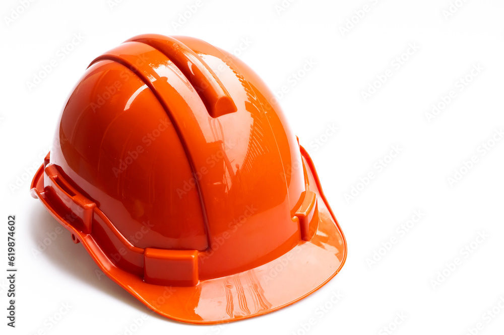 Red engineer helmet isolated on white background.. Red engineer helmet isolated on white background..