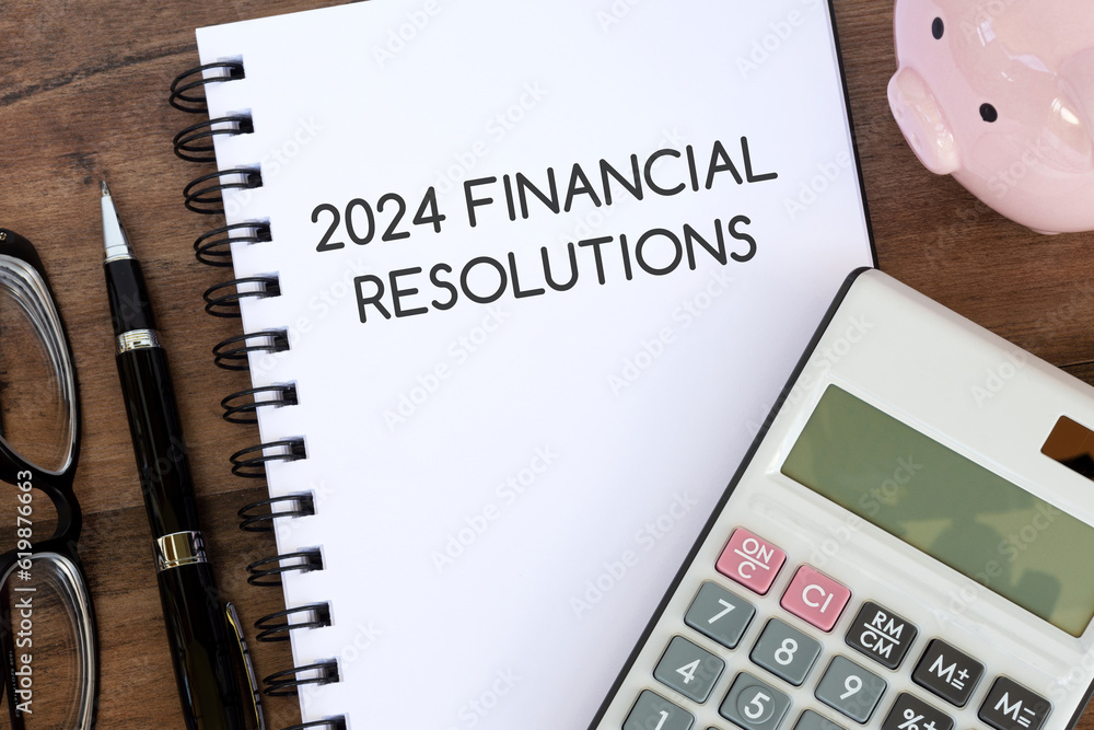 Notepad with text 2024 financial resolutions Notepad with text 2024 financial resolutions