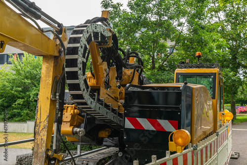 Photography Close up of the mechanism of anA trencher machine for digging trenches
