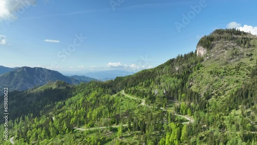 Vellacher Kotschna Valley in the Kamnik Savinja Alps on the border of Austria and Slovenia during a beautiful springtime day. photo