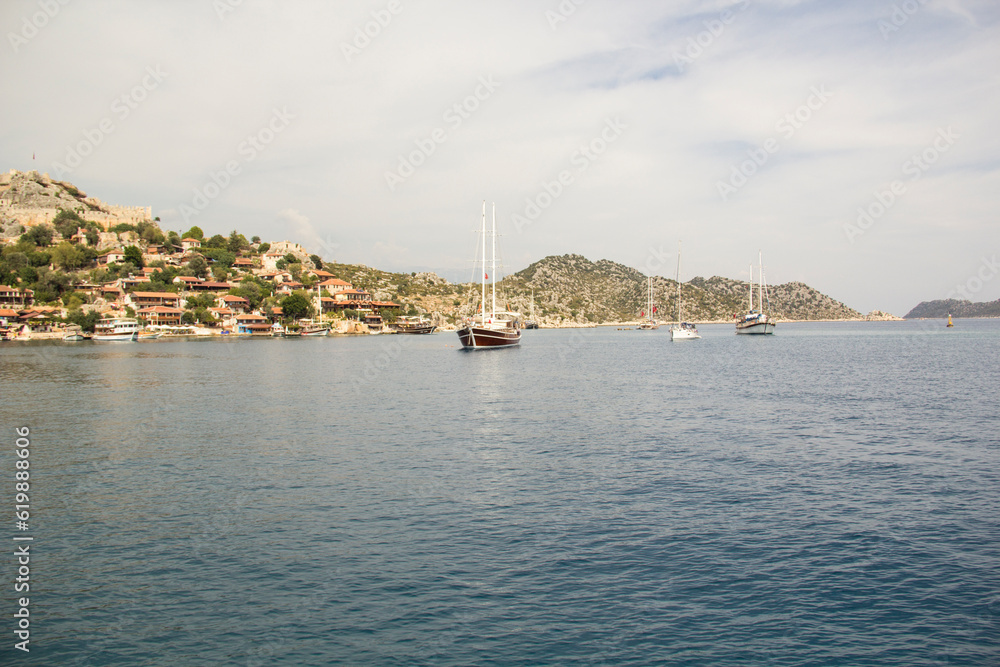 Beautiful view of the sea bay and pleasure yachts on a sunny summer day, in Turkey Beautiful view of the sea bay and pleasure yachts on a sunny summer day, in Turkey