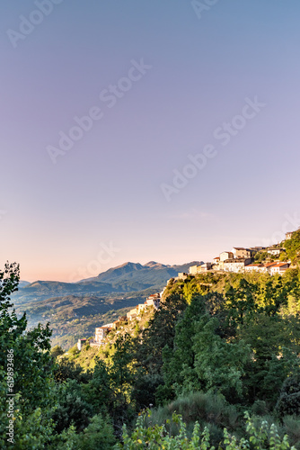 Italian Landscape on the Countryside with Fog at Sunrise in Basilicata, in the South of Italy on Blurred Background photo