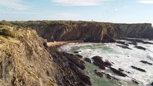 Wallpaper Mural Portugal's west coast with sandy beaches and a clear Atlantic Ocean with soft light warming the sand. Algarve Region. Holidays on the beach. 4k video Torontodigital.ca