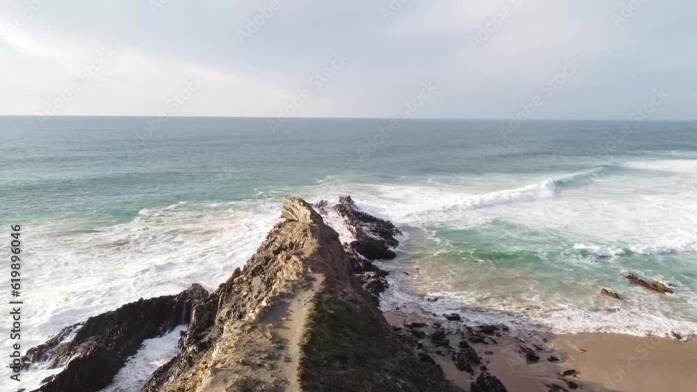 Portugal's west coast with sandy beaches and a clear Atlantic Ocean with soft light warming the sand. Algarve Region. Holidays on the beach. 4k video Portugal's west coast with sandy beaches and a clear Atlantic Ocean with soft light warming the sand. Algarve Region. Holidays on the beach. 4k video