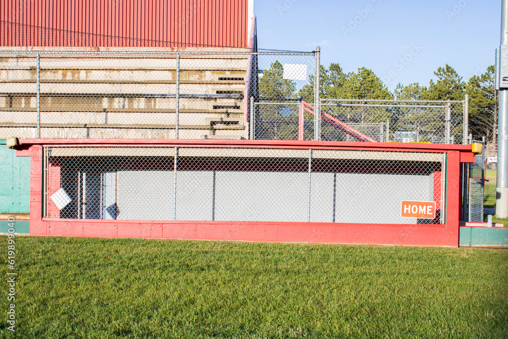 home team dugout at a baseball field - obrazy, fototapety, plakaty 