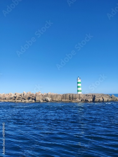 Obraz na płótnie lighthouse in the sea w salonie