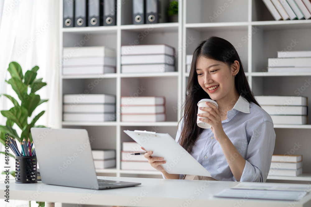 Beautiful Asian woman is a businesswoman who leads a new generation of startups, a woman who runs and manages a business plan to build confidence and stability in business, woman-led business concept. Beautiful Asian woman is a businesswoman who leads a new generation of startups, a woman who runs and manages a business plan to build confidence and stability in business, woman-led business concept.