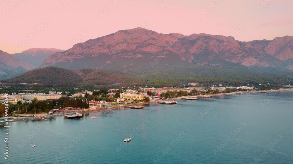 beauty of Kemer from a new perspective with breathtaking aerial view, showcasing a stunning panorama of hotels nestled amidst the scenic mountain landscape. beauty of Kemer from a new perspective with breathtaking aerial view, showcasing a stunning panorama of hotels nestled amidst the scenic mountain landscape.