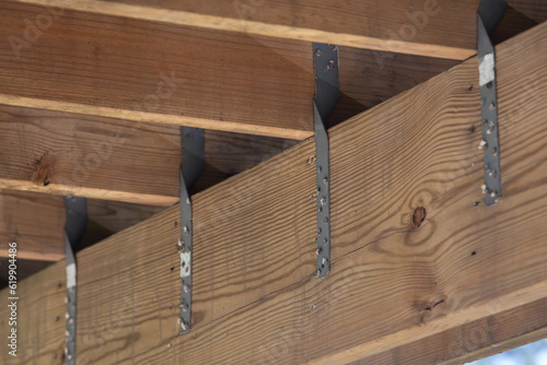 Framing hurricane straps under house