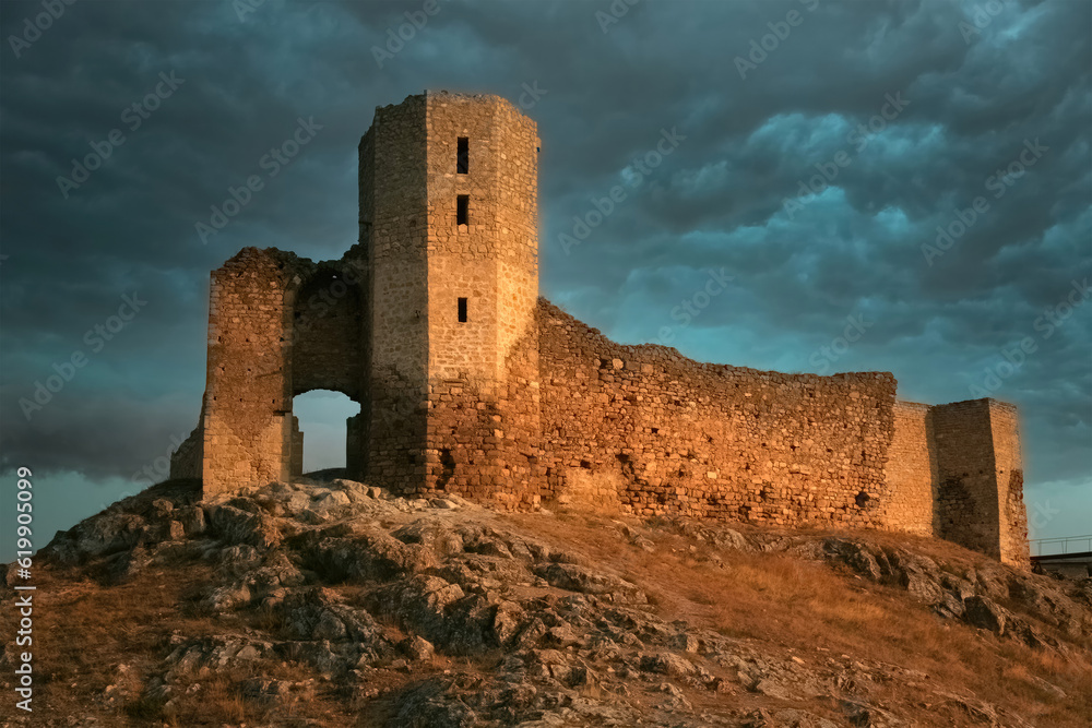 Fortress on the mountain during the storm. Biblical concept of the tower of escape.
