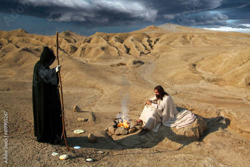 Temptation of Christ by Satan. Stones and loaves near a fire of dry branches.