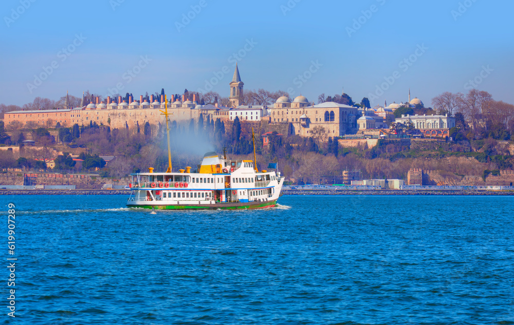 Famous historical peninsula of Istanbul - Hagia sophia, Sultanahmet Mosque - Istanbul, Turkey - Water trail foaming behind a passenger ferry boat - Bosphorus, Istanbul