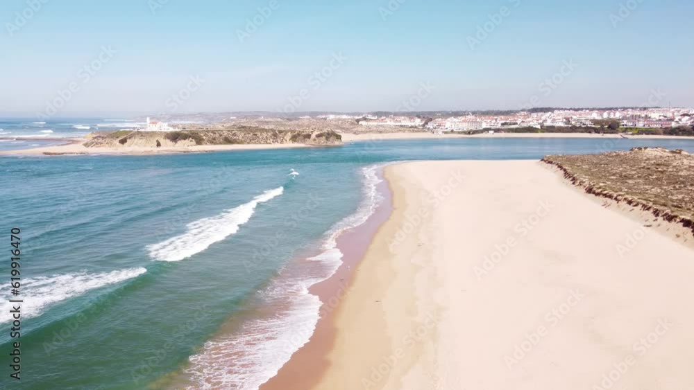 Portugal's west coast with sandy beaches and a clear Atlantic Ocean with soft light warming the sand. Algarve Region. Holidays on the beach. 4k video Portugal's west coast with sandy beaches and a clear Atlantic Ocean with soft light warming the sand. Algarve Region. Holidays on the beach. 4k video