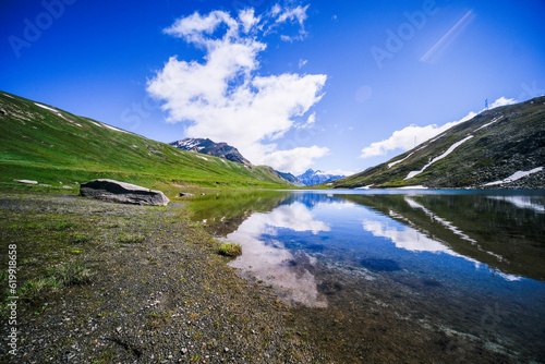 panorama of Colle del Nivolet , Aosta Italy in sunny day with lake