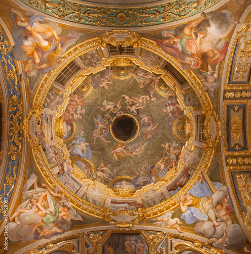 GENOVA, ITALY - MARCH 5, 2023: The side cupola with the fresco of cardinal virtues and prophets and in the church Chiesa del Gesu by Bernardo Castello from 17. cent.