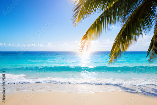 Natural blurred defocused background for concept summer vacation. Nature of tropical summer beach with rays of sunlight. Light sand beach ocean water sparkles against blue sky.