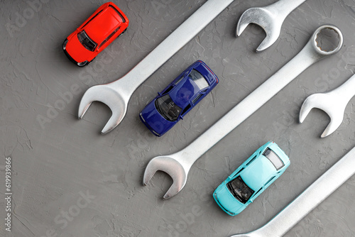 top view of car models and wrenches