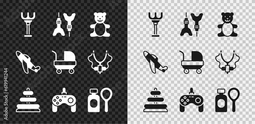 Set Rake toy, Dart arrow, Teddy bear plush, Pyramid, Gamepad, Soap bubbles bottle, Toy plane and Baby stroller icon. Vector