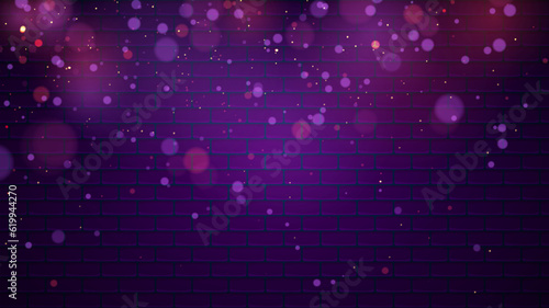 Glittering fairy dust particles. Purple sparks and stars shine with a special light effect on a brick background.