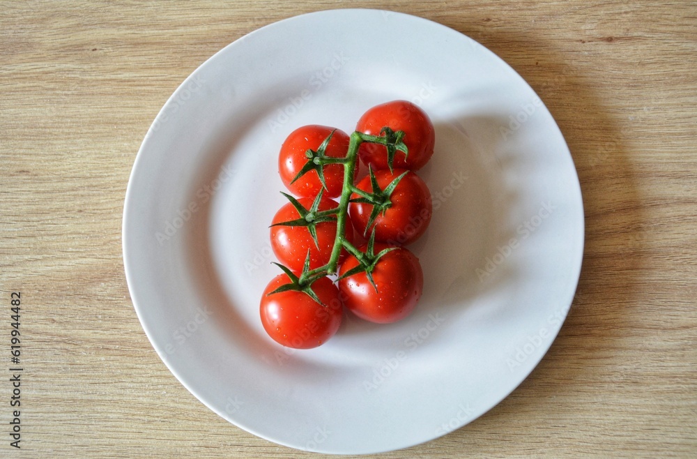 tomatoes on a plate tomatoes on a plate