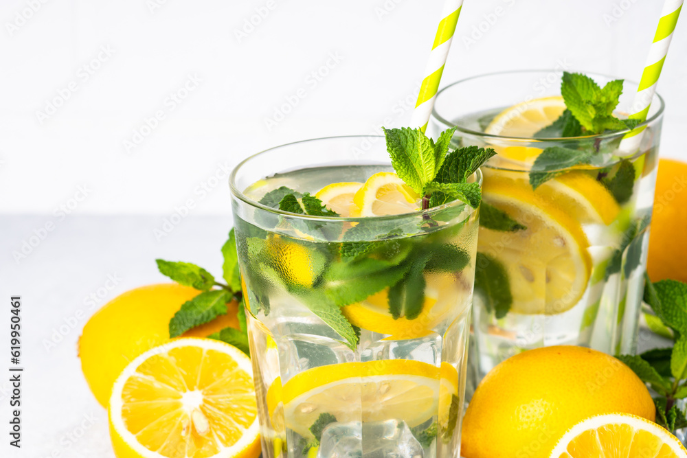 Fototapeta premium Lemonade in glass on white table.