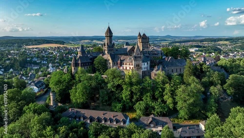 Medieval castle in Braunfels, Hesse, Germany, with many later additions. Aerial 4K revealing video in summer in sunset light
