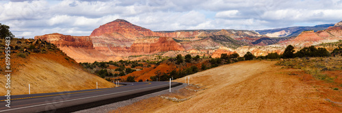 Scenic panorama landscape view of Utah State Route 24 near Torrey, Utah. Selective focus, background blur and foreground blur. 
 photo