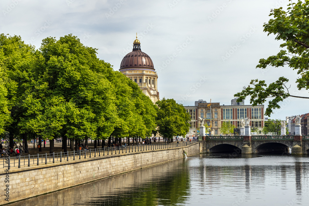 The Schloss Bridge over the Spree canal, with the dome of the rebuilt Berlin City Palace in the distance, Berlin.