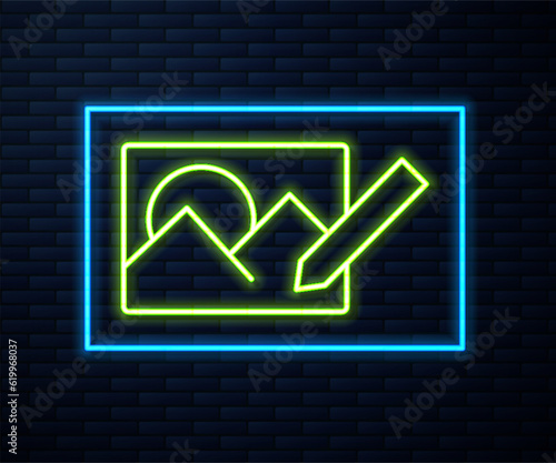 Glowing neon line Photo retouching icon isolated on brick wall background. Photographer, photography, retouch icon. Vector