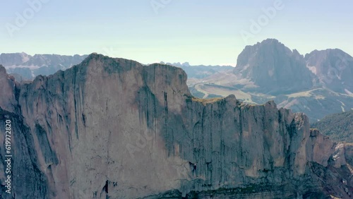 Seceda Aerial drone view flying above a peaceful alpine mountain top trekking area of the dolomite mountain range in val gardena italy 04