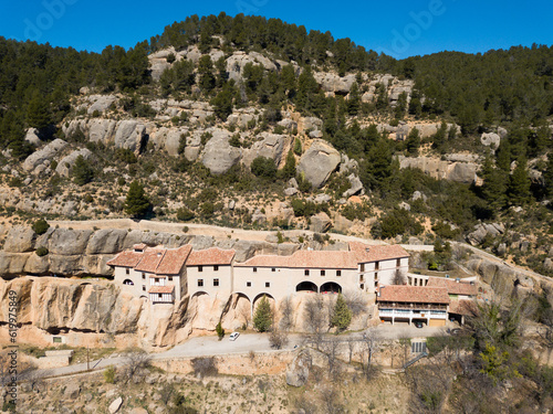 Sanctuary of Virgin of Balma in natural grotto in mountain next to Spanish village of Sorita photo