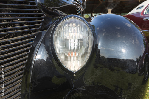 Oval HeadLight from 1937 Black Ford.  © Loren Biser