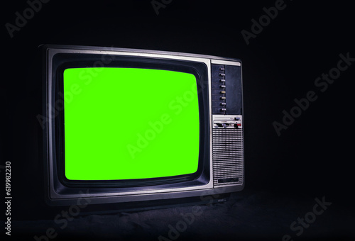 Fotomurale Retro old TV It's still life with green screen in dark room