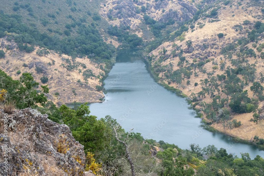 Overview of a portion of the Rector reservoir near Yountville in Napa County, from the trail of the same name, showing that the water supply is full