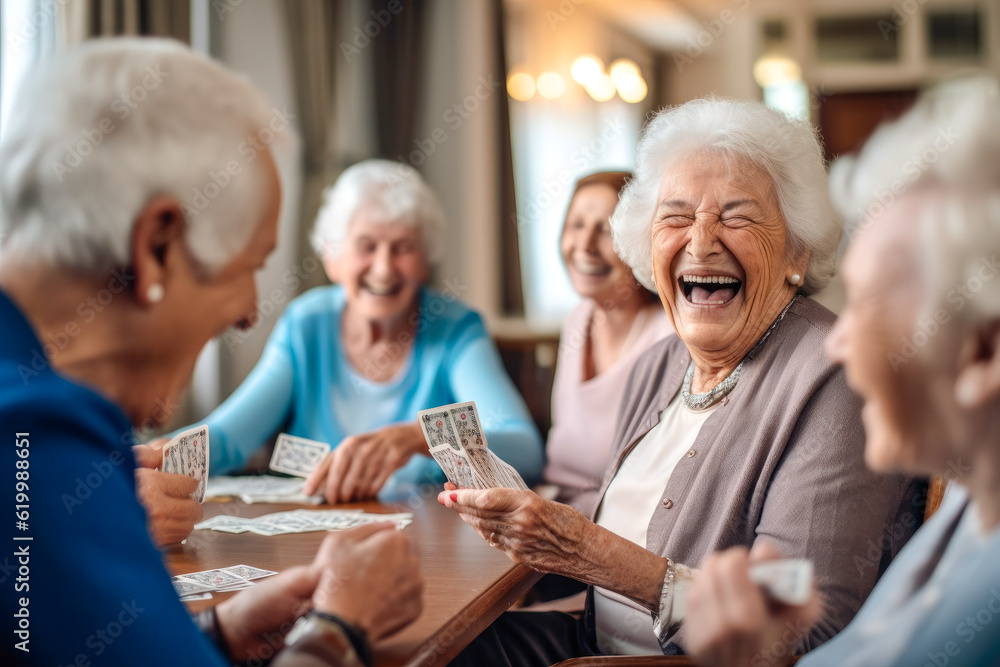 A joyful group of seniors playing cards and sharing a laughter in a retirement nursing home, camaraderie and enjoyment create a warm and lively atmosphere, generative ai A joyful group of seniors playing cards and sharing a laughter in a retirement nursing home, camaraderie and enjoyment create a warm and lively atmosphere, generative ai