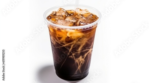 Tasty ice coffee drink with ice cubes in a wet cold glass with a black straw on the dark table in the outdoor cafe on the blurred background with text space can use for advertising  ads  branding