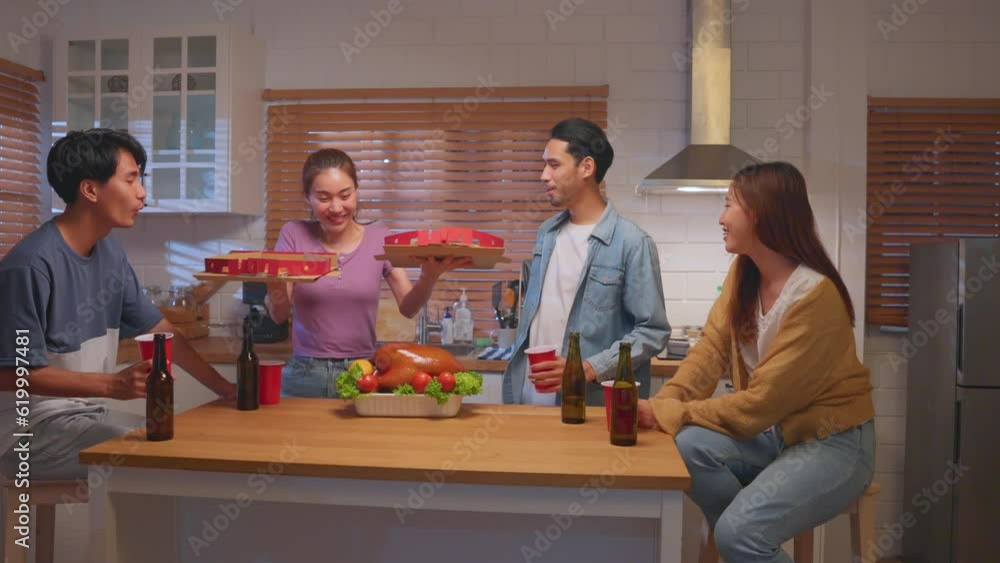 Group of Asian friend having dinner, enjoy evening party together at home.