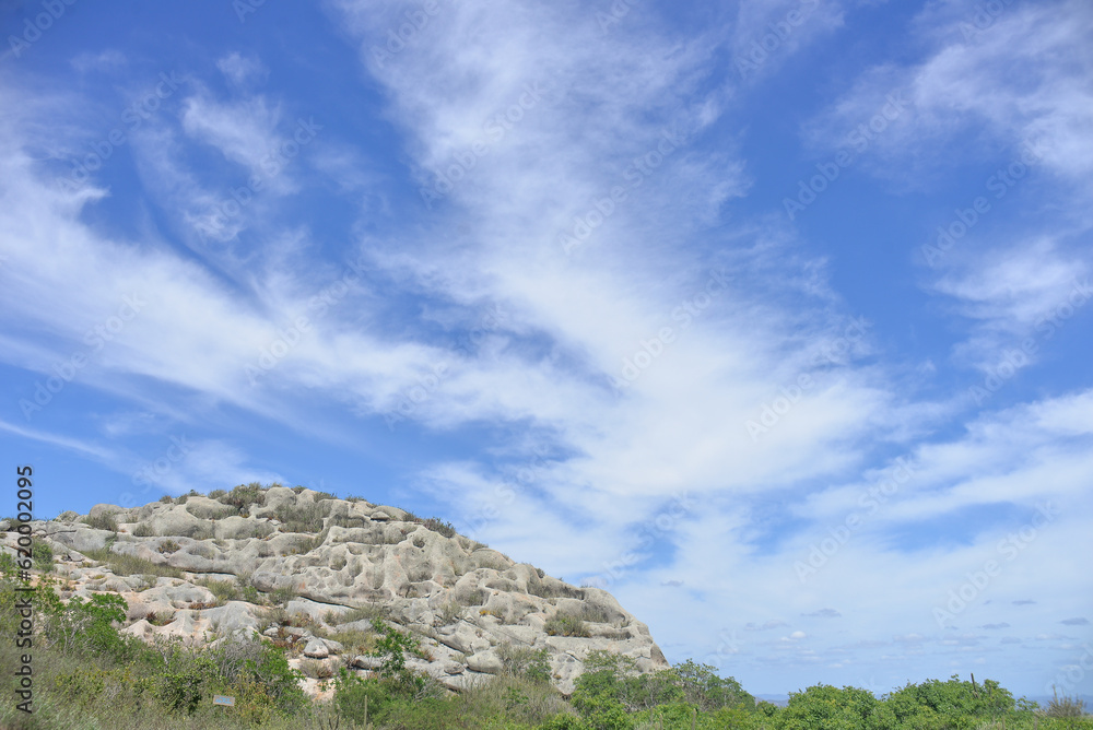 view of the hills, clouds over the mountains, mountainous landscape, Pedra de São Pedro,rocks and blue sky with clouds, Monte das Gameleiras, Brazil, trails in brazil, trails in northeastern Brazil