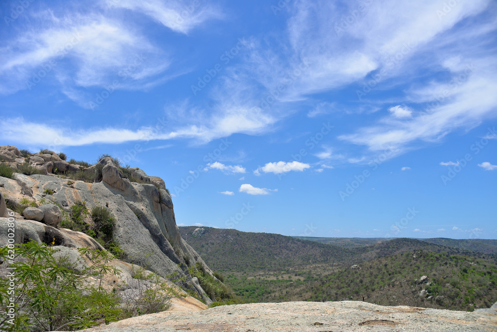 clouds over the mountains,mountain landscape, blue sky and clouds, rocks and blue sky with clouds, Monte das Gameleiras, Brazil, trails in brazil, trails in northeast Brazil, tourism
 