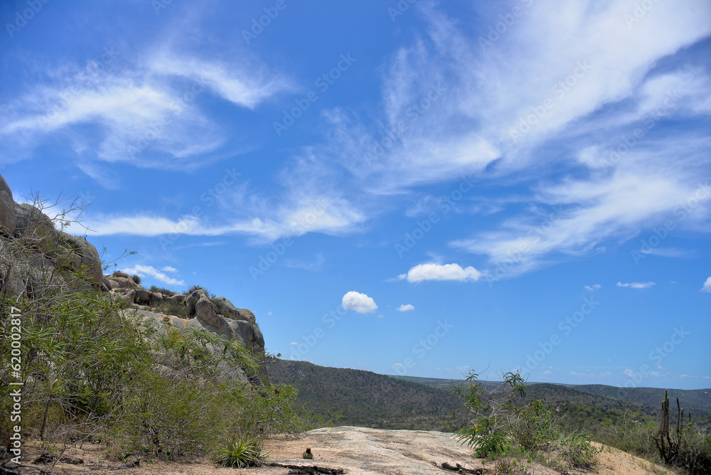 clouds over the mountains,mountain landscape, blue sky and clouds, rocks and blue sky with clouds, Monte das Gameleiras, Brazil, trails in brazil, trails in northeast Brazil, tourism
