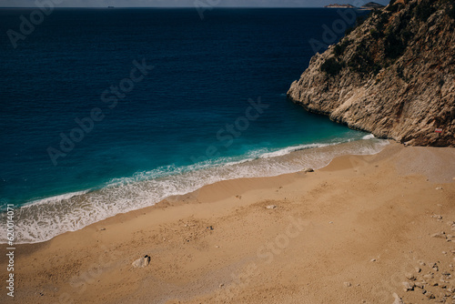 Fototapeta Naklejka Na Ścianę i Meble -  Kaputas beach with blue water on the coast of Antalya region in Turkey - may 2023