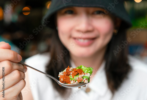 Asia woman eating salad for diet