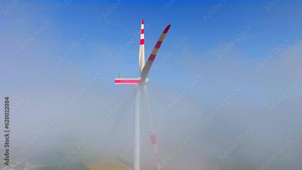 Wind Turbine Blades Visible Through Fog In Weinviertel, Austria - aerial, close up Wind Turbine Blades Visible Through Fog In Weinviertel, Austria - aerial, close up