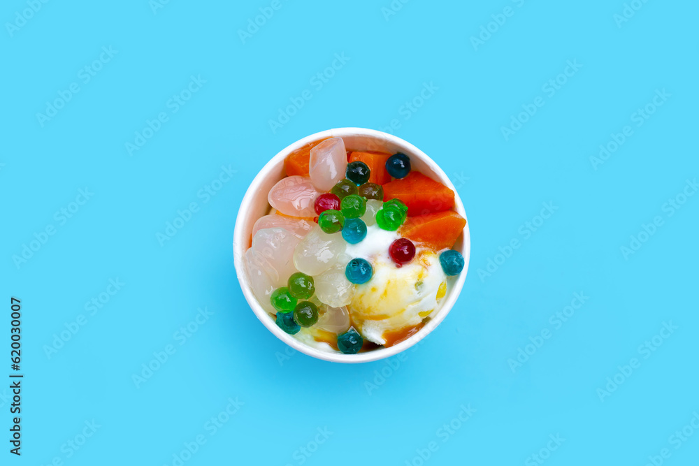 Ice cream cup with topping