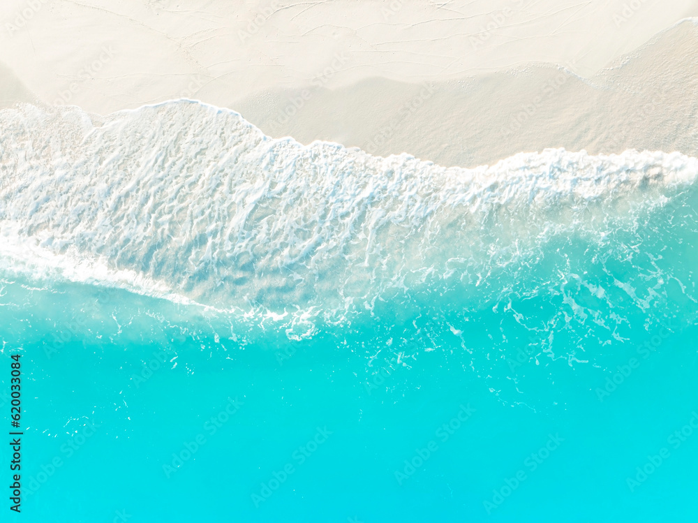 Summer tropical with Waves on the beach as a background Summer tropical with Waves on the beach as a background