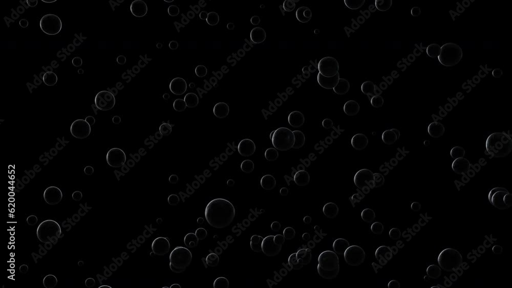 Slow rise of bubbles on a dark background. Slow rise of bubbles on a dark background.