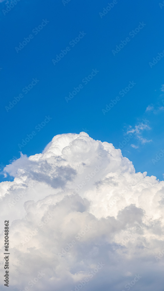 Big white curly cloud in the blue sky Big white curly cloud in the blue sky
